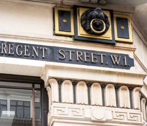 A traditional sign for Regent Street, one of central London's most popular shopping streets.